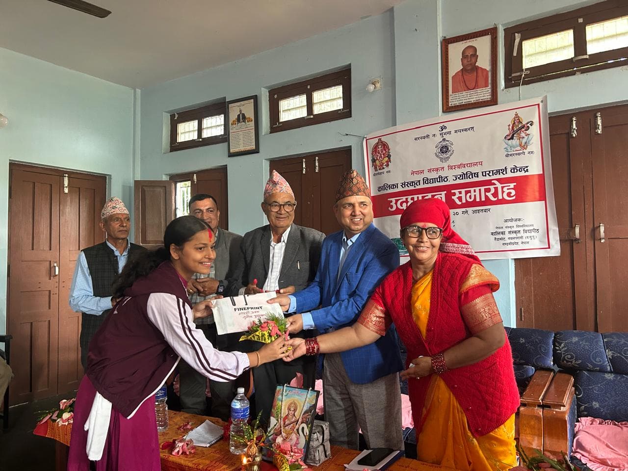 Faculty presenting an award to a recipient